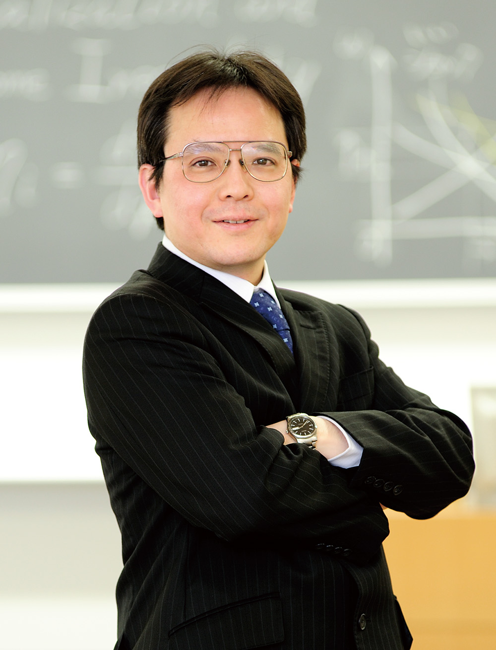 現代経営研究科研究科長　田中　巌